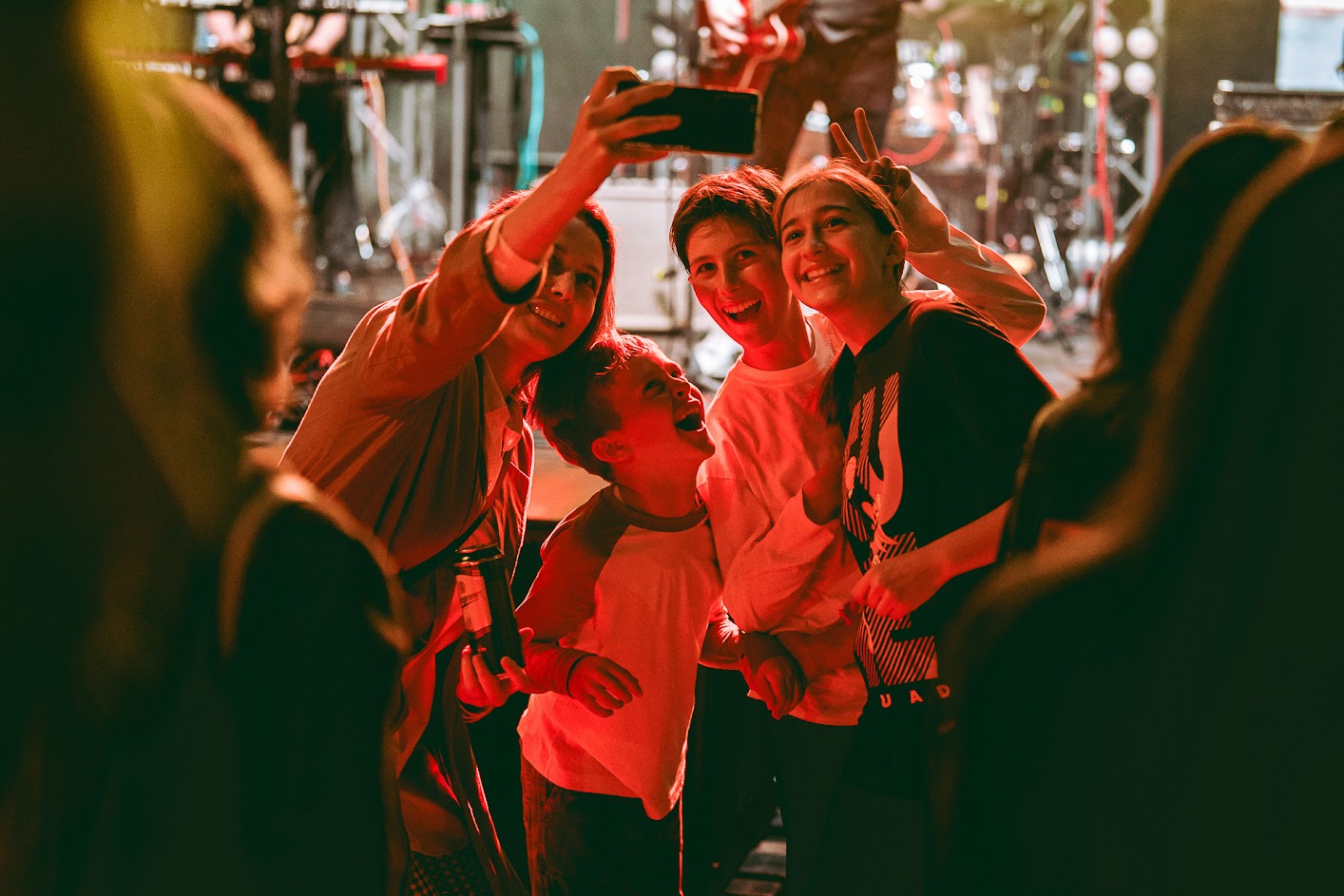 Young people taking a selfie in front of the stage at the Bavarin street food festival