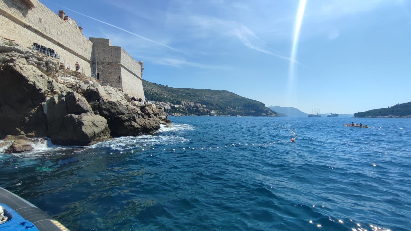 Floating safety barrier line in the sea below Dubrovnik's city walls