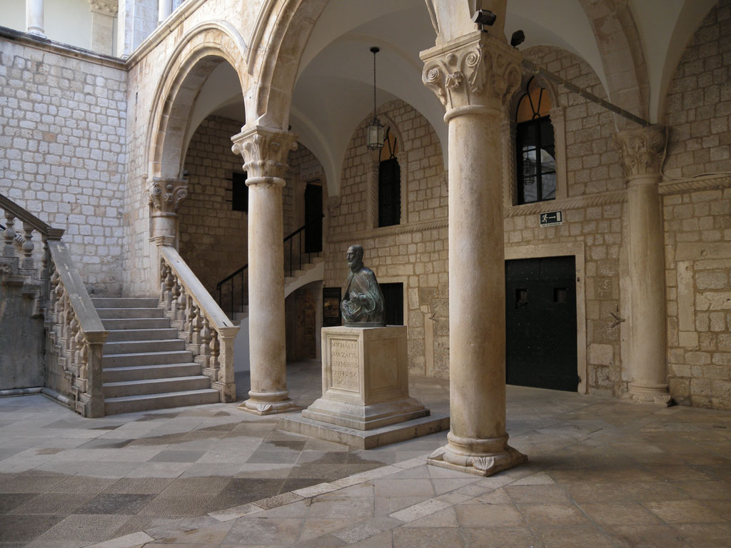 Atrium of the Rector's Palace with a bronze bust of Miho Pracat and a stone staircase