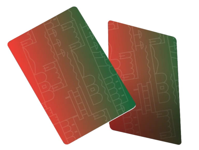 Two red and green Dubrovnik Digital Nomad Cards with a line-drawn city pattern